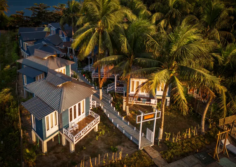 The villa row in golden island light
