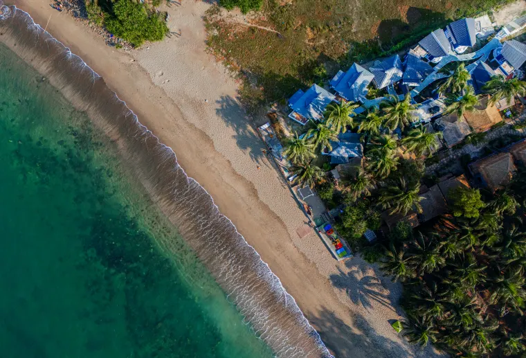 Turquoise water along the resort shore